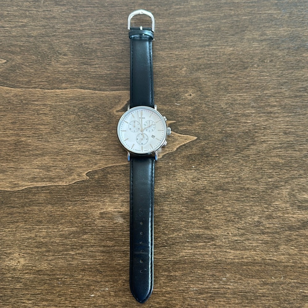 Timex Watch with genuine leather band. Very nice.